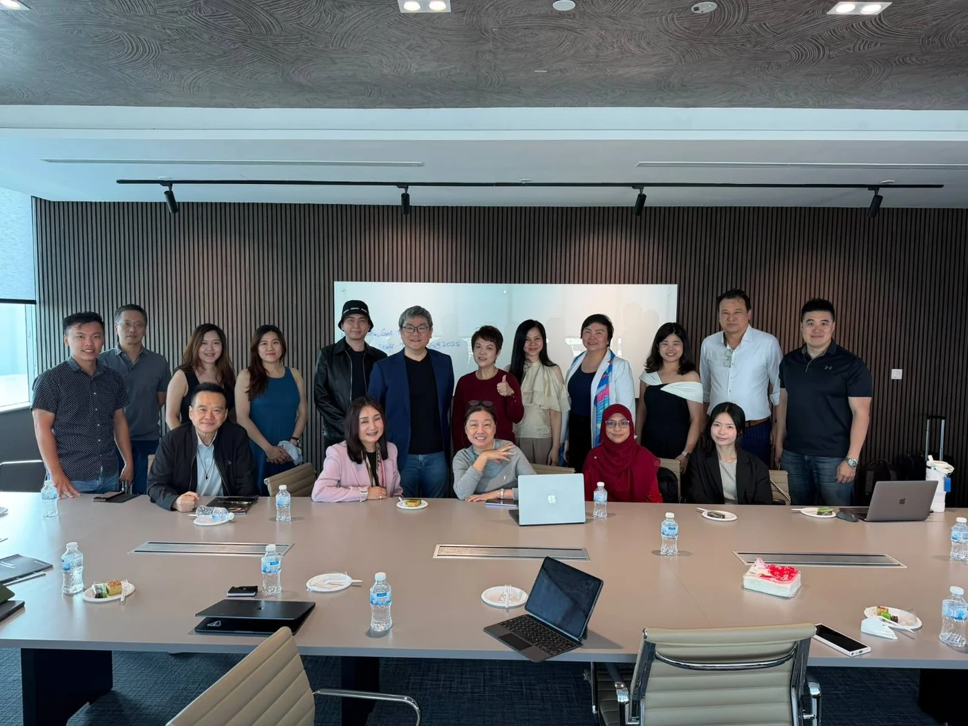 Participants of the Doctors&rsquo; Forum gathered around the boardroom table for a group photograph at the close of the session.